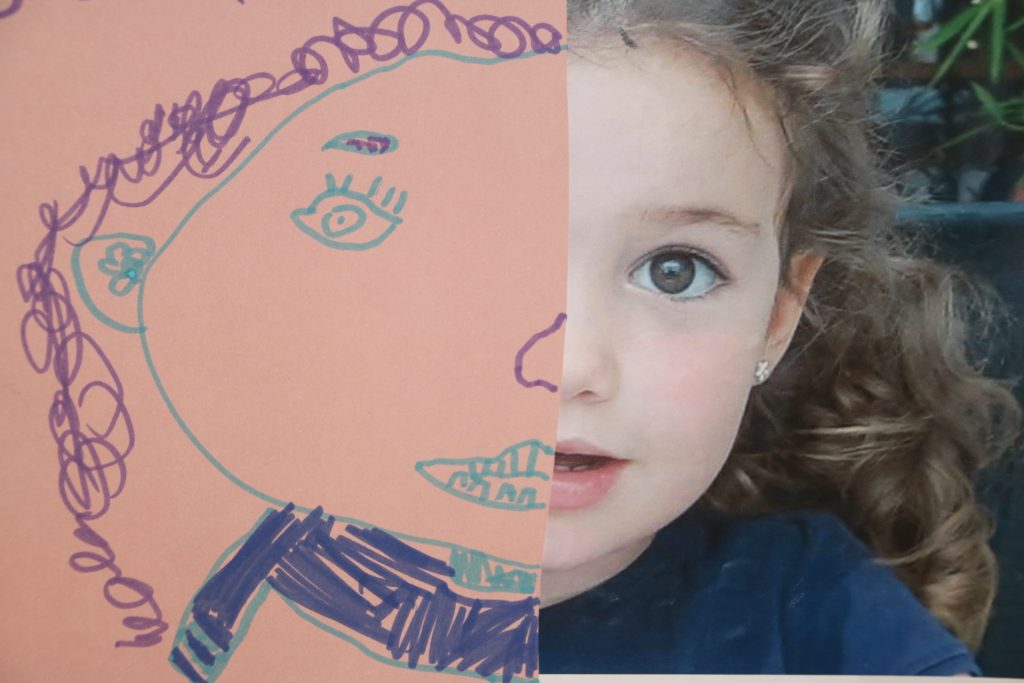 Imagen de una alumna de infantil con su autorretrato